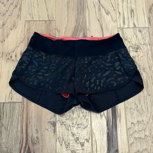 Lululemon Black on Black Cheetah Print Shorts with Pink Inside, size 4